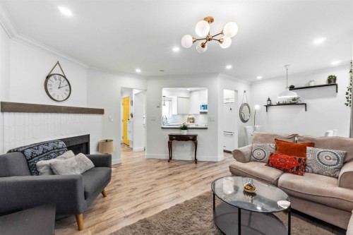 11-7400 Minoru Boulevard, Richmond, BC - Indoor Photo Showing Living Room With Fireplace