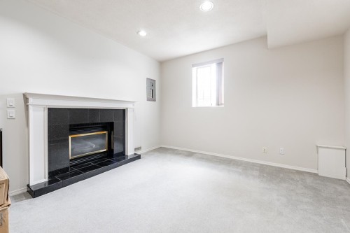 2917 Kalamalka Drive, Coquitlam, BC - Indoor Photo Showing Living Room With Fireplace