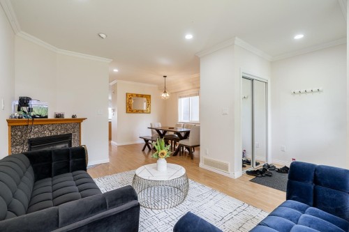 1124 Rochester Avenue, Coquitlam, BC - Indoor Photo Showing Living Room With Fireplace