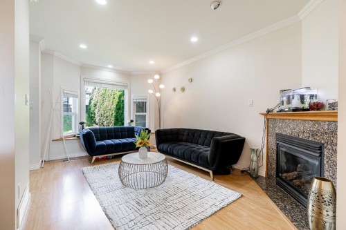 1124 Rochester Avenue, Coquitlam, BC - Indoor Photo Showing Living Room With Fireplace