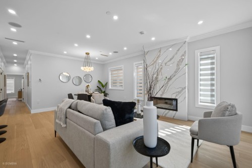 1-2035 51St E, Vancouver, BC - Indoor Photo Showing Living Room With Fireplace