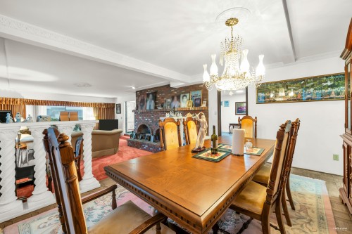 4240 Shackleton Gate, Richmond, BC - Indoor Photo Showing Dining Room With Fireplace