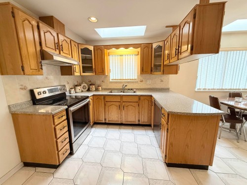 2458 5Th Avenue E, Vancouver, BC - Indoor Photo Showing Kitchen With Double Sink
