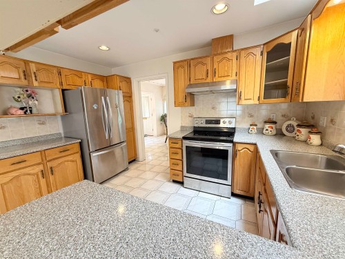 2458 5Th Avenue E, Vancouver, BC - Indoor Photo Showing Kitchen With Double Sink