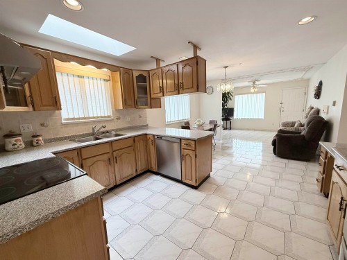 2458 5Th Avenue E, Vancouver, BC - Indoor Photo Showing Kitchen With Double Sink