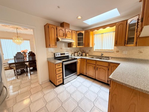 2458 5Th Avenue E, Vancouver, BC - Indoor Photo Showing Kitchen With Double Sink
