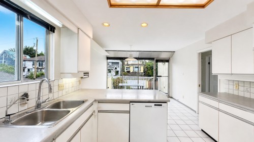 4438 4Th Avenue W, Vancouver, BC - Indoor Photo Showing Kitchen With Double Sink