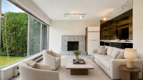 4438 4Th Avenue W, Vancouver, BC - Indoor Photo Showing Living Room With Fireplace
