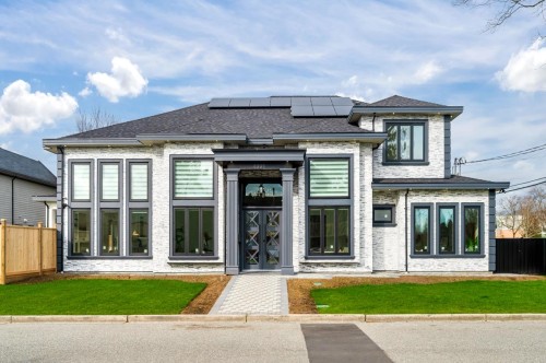 4991 Cabot Drive, Richmond, BC - Outdoor With Facade