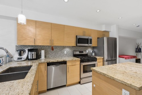 204-2832 Capilano Road, North Vancouver, BC - Indoor Photo Showing Kitchen With Stainless Steel Kitchen With Double Sink With Upgraded Kitchen
