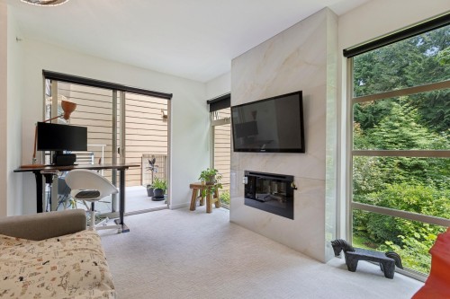 204-2832 Capilano Road, North Vancouver, BC - Indoor Photo Showing Other Room With Fireplace