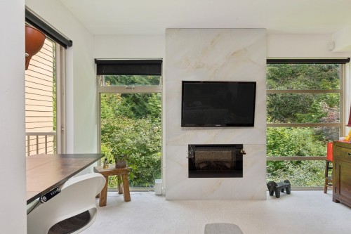 204-2832 Capilano Road, North Vancouver, BC - Indoor Photo Showing Living Room With Fireplace