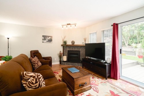 22-795 Noons Creek Drive, Port Moody, BC - Indoor Photo Showing Living Room With Fireplace