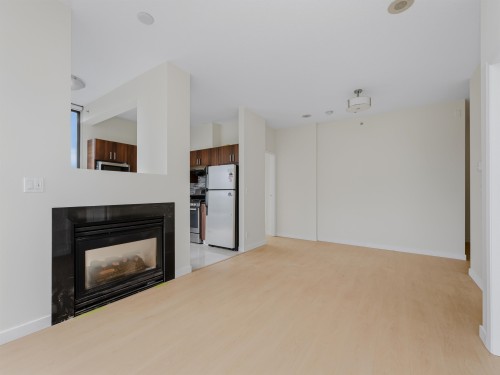 2304-1239 Georgia Street W, Vancouver, BC - Indoor Photo Showing Living Room With Fireplace