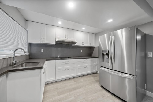 2480 Gale Avenue, Coquitlam, BC - Indoor Photo Showing Kitchen With Double Sink