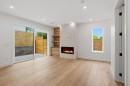 2-2438 20Th Avenue E, Vancouver, BC  - Indoor Photo Showing Other Room With Fireplace 