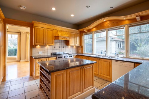 3808 13Th Avenue W, Vancouver, BC - Indoor Photo Showing Kitchen With Double Sink