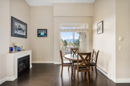 406-12283 224 Street, Maple Ridge, BC - Indoor Photo Showing Dining Room With Fireplace