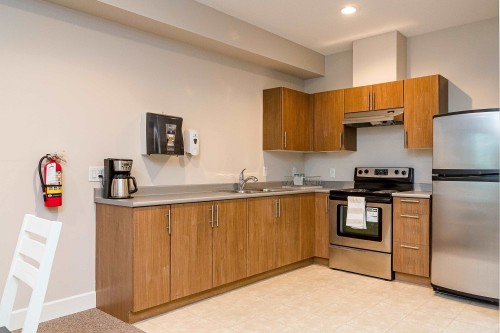 406-12283 224 Street, Maple Ridge, BC - Indoor Photo Showing Kitchen With Double Sink