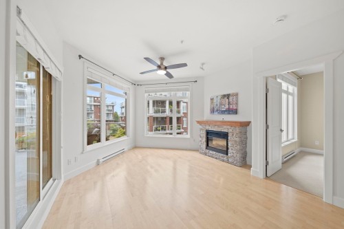 206-4211 Bayview Street, Richmond, BC - Indoor Photo Showing Living Room With Fireplace