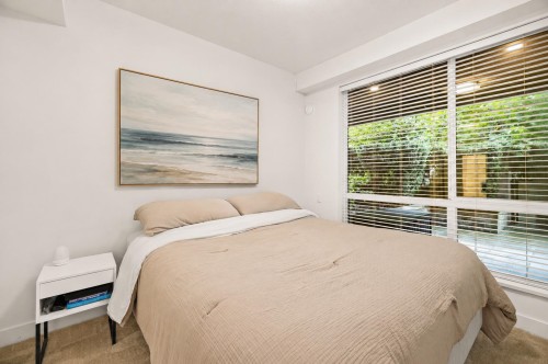 103-719 3Rd Street W, North Vancouver, BC - Indoor Photo Showing Bedroom