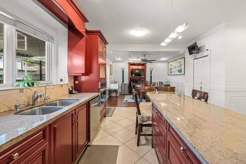 3557 47Th Avenue E, Vancouver, BC - Indoor Photo Showing Kitchen With Double Sink