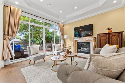 4077 13Th Avenue W, Vancouver, BC - Indoor Photo Showing Living Room With Fireplace
