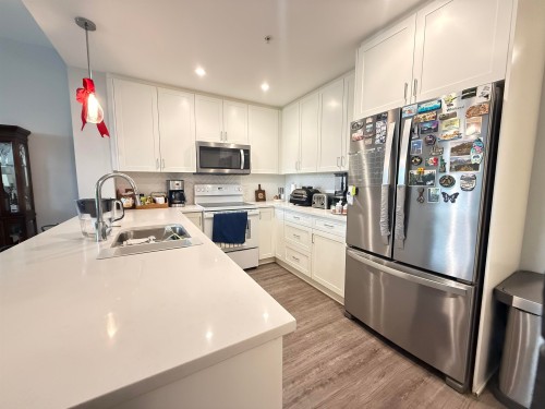 4413-2180 Kelly Avenue, Port Coquitlam, BC - Indoor Photo Showing Kitchen With Stainless Steel Kitchen With Double Sink