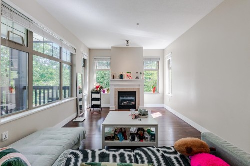 209-4885 Valley Drive, Vancouver, BC - Indoor Photo Showing Living Room With Fireplace