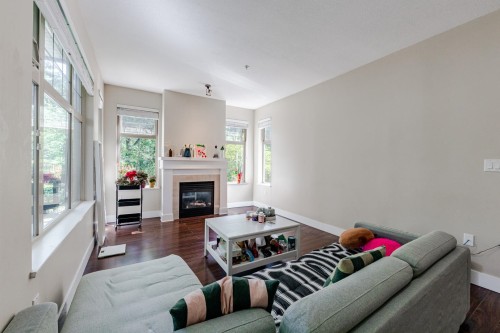 209-4885 Valley Drive, Vancouver, BC - Indoor Photo Showing Living Room With Fireplace