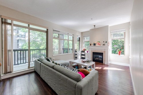 209-4885 Valley Drive, Vancouver, BC - Indoor Photo Showing Living Room With Fireplace