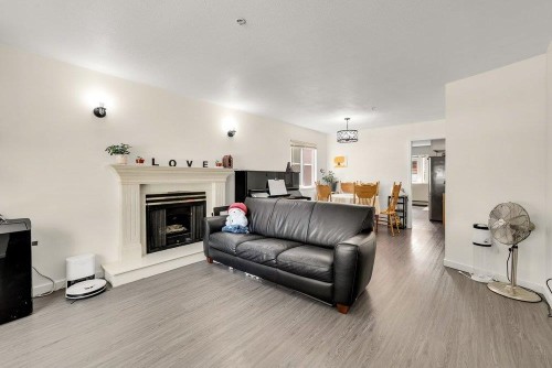 2038 26Th Avenue E, Vancouver, BC - Indoor Photo Showing Living Room With Fireplace