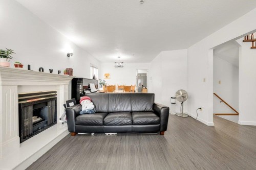 2038 26Th Avenue E, Vancouver, BC - Indoor Photo Showing Living Room With Fireplace