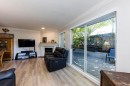 7-249 4Th Street E, North Vancouver, BC  - Indoor Photo Showing Living Room With Fireplace 