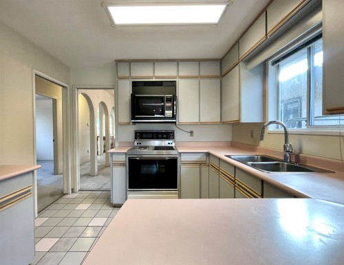 937 18Th Avenue W, Vancouver, BC - Indoor Photo Showing Kitchen With Double Sink