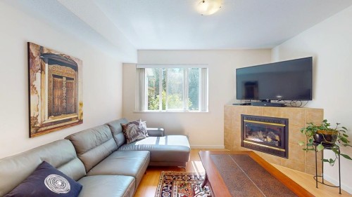 34-735 Park Road, Gibsons, BC - Indoor Photo Showing Living Room With Fireplace