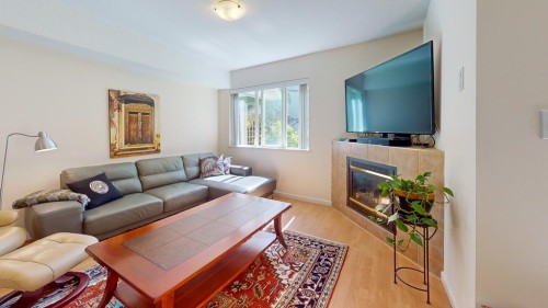34-735 Park Road, Gibsons, BC - Indoor Photo Showing Living Room With Fireplace