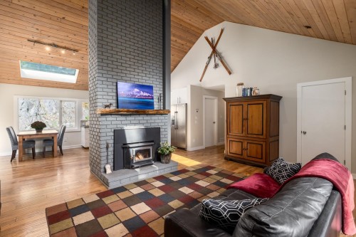 1302 Adams Road, Bowen Island, BC - Indoor Photo Showing Living Room With Fireplace