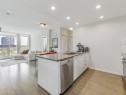 711-3281 Kent Avenue North E, Vancouver, BC  - Indoor Photo Showing Kitchen With Double Sink 