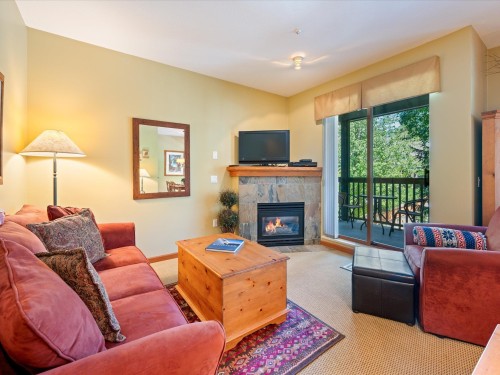 117-4355 Northlands Boulevard, Whistler, BC - Indoor Photo Showing Living Room With Fireplace