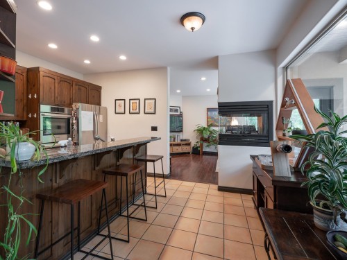 5836 Marine Way, Sechelt, BC - Indoor Photo Showing Kitchen With Fireplace