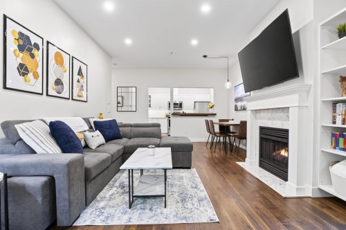 106-4745 54A Street, Delta, BC - Indoor Photo Showing Living Room With Fireplace