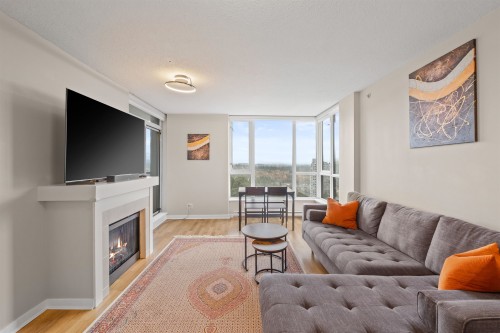 3003-1178 Heffley Crescent, Coquitlam, BC - Indoor Photo Showing Living Room With Fireplace