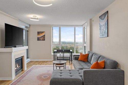 3003-1178 Heffley Crescent, Coquitlam, BC - Indoor Photo Showing Living Room With Fireplace