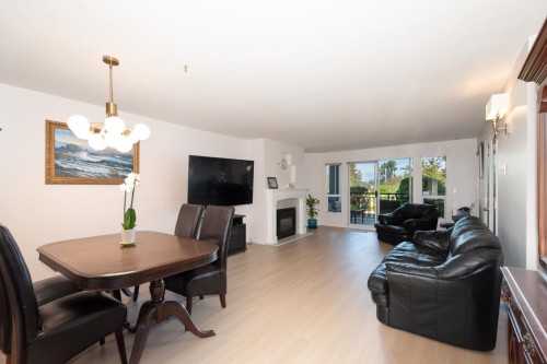 112-4955 River Road, Delta, BC - Indoor With Fireplace