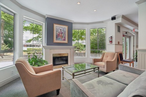 116-5835 Hampton Place, Vancouver, BC - Indoor Photo Showing Living Room With Fireplace