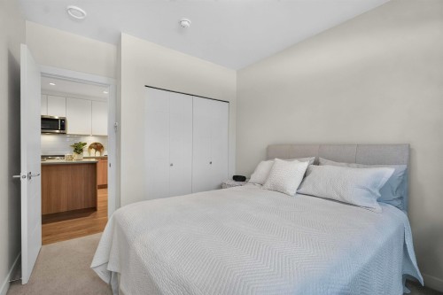 103-707 Como Lake Avenue, Coquitlam, BC - Indoor Photo Showing Bedroom