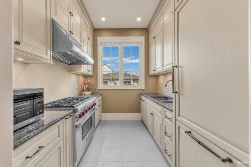 6963 Fremlin Street, Vancouver, BC - Indoor Photo Showing Kitchen With Double Sink
