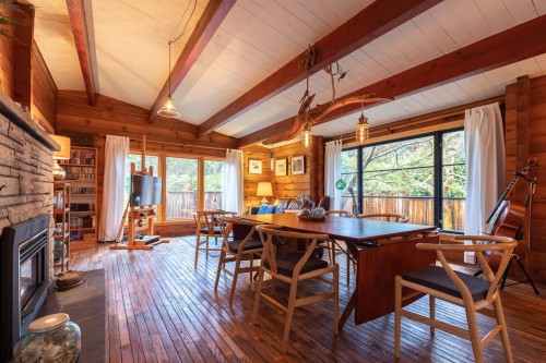 5817 Eagle Island, West Vancouver, BC - Indoor Photo Showing Dining Room With Fireplace