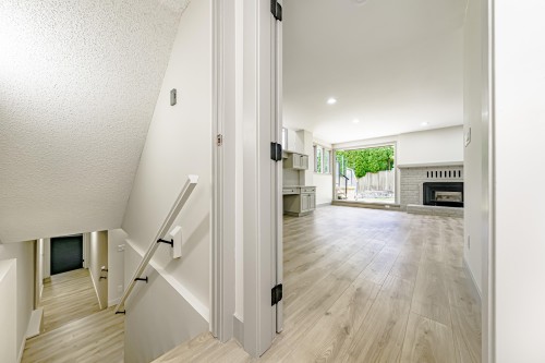 7516 Lambeth Drive, Burnaby, BC - Indoor Photo Showing Other Room With Fireplace